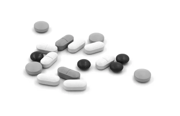 Zwart Witte Tabletten Pillen Een Witte Achtergrond — Stockfoto