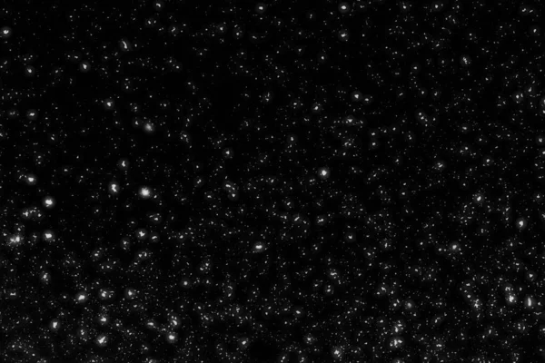 Siyah arkaplanda kaotik beyaz bokeh, ışık lekeleri dokusu, soyut bulanıklık, düşen kar, yıldızlı gökyüzü