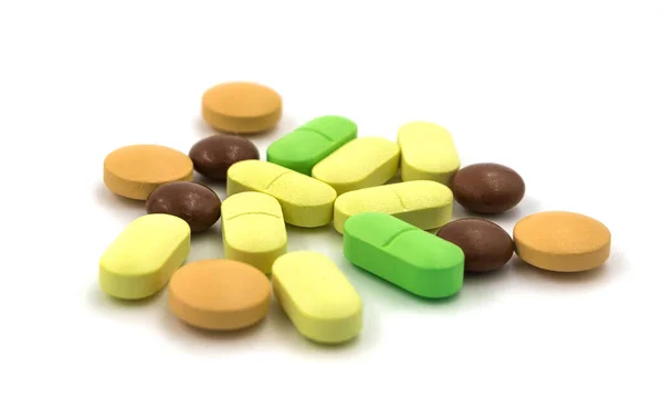 Veelkleurige Tabletten Pillen Een Witte Achtergrond — Stockfoto
