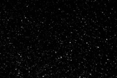 Siyah arka planda beyaz lekeler ve izler var. Beyaz bulanıklık ve dalgalanmalar. Kar yağışı, soyutlama