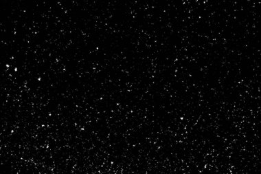 Siyah arka planda beyaz lekeler ve izler var. Beyaz bulanıklık ve dalgalanmalar. Kar yağışı, soyutlama