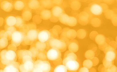 Sarı bokeh arkaplan dokusu. Altın bulanık parlak parlak ışık dokusu