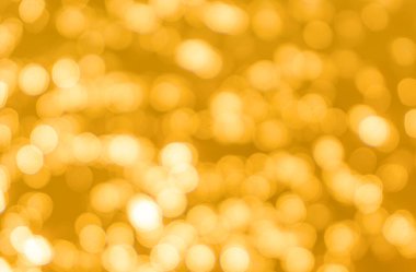 Sarı bokeh arkaplan dokusu. Altın bulanık parlak parlak ışık dokusu