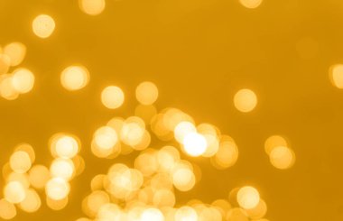 Sarı bokeh arkaplan dokusu. Altın bulanık parlak parlak ışık dokusu