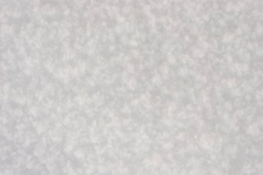 Beyaz saf kar dokusu, taze kar dokusu arkaplanı, sert karlı yüzey.