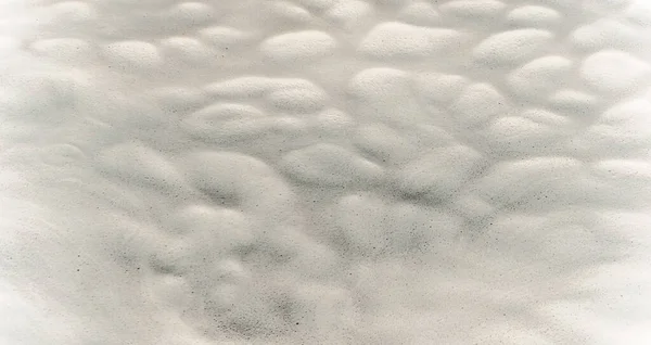 white foam on water and waves background texture,  gray river froth, cumulus foam, airy foam, beige sea lake foam, foam on the water with bubbles, foam aggregates, white foam close-up macro, lather