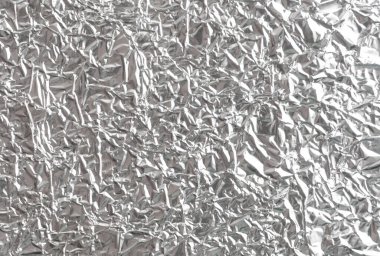 Gümüş kırışık folyo arka plan dokusu, buruşuk alüminyum folyo, soyut parlak arkaplan