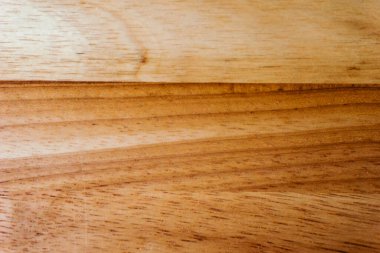 Kahverengi ahşap ahşap kaplama arka plan, grunge kesim tahtası, doğal desenli ceviz ağacı deseni.