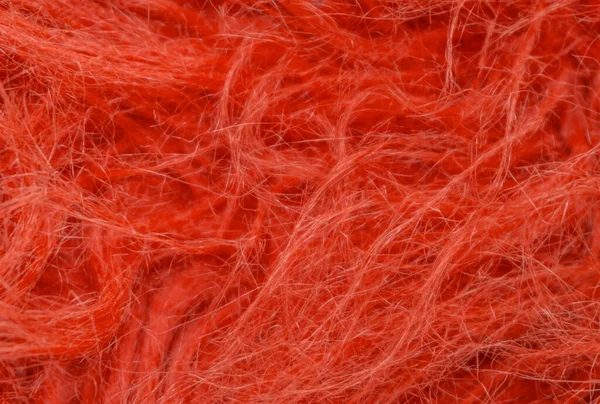 赤いふわふわのウールのテクスチャ 動物のウールの背景 塗装毛皮のテクスチャを閉じます — ストック写真