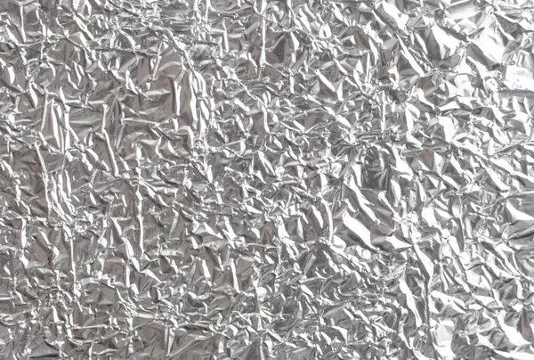 Gümüş kırışık folyo arka plan dokusu, buruşuk alüminyum folyo, soyut parlak arkaplan