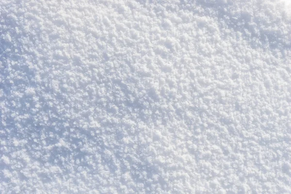 太陽の雪のテクスチャ 新雪の質感の背景に輝く白 — ストック写真