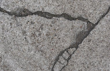 Çatlak arka plan desenli eski beton alçı duvar