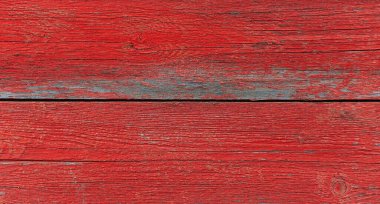 Kırmızıya boyanmış arka plan desenli eski ahşap tahtalar.