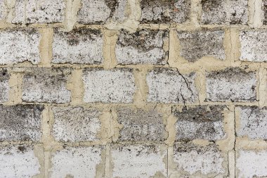 Beton bloklardan oluşan gri eski duvar arka plan, gri eskimiş beton tuğlalar.