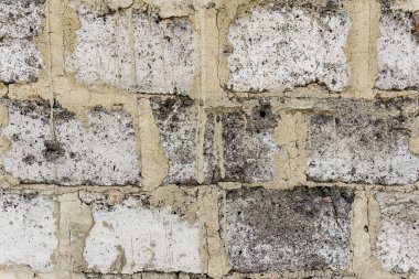 Beton bloklardan oluşan gri eski duvar arka plan, gri eskimiş beton tuğlalar.
