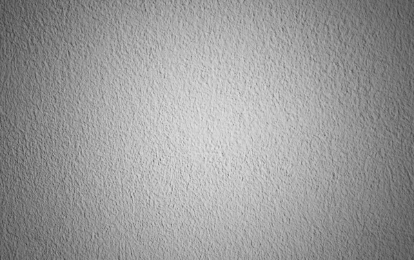 Koyu kenarlı beyaz beton duvar, parlak lekeli koyu alçı duvar, tasarımcılar için arka plan, siyah vignette ile beton duvar dokusu