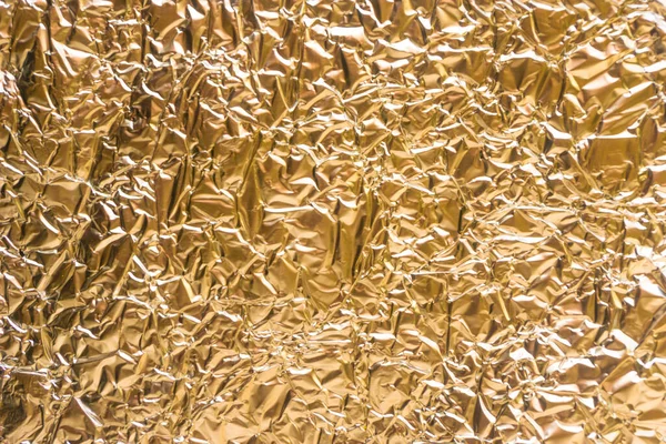 Gold Runzelige Lebensmittelfolie Hintergrundstruktur Zerknitterte Gelbe Folie Abstrakt Glänzender Hintergrund — Stockfoto