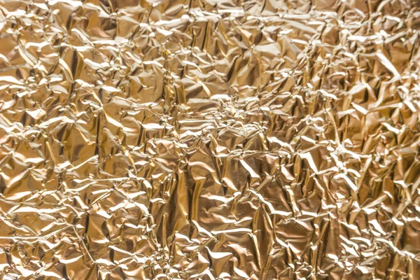 Gold Runzelige Lebensmittelfolie Hintergrundstruktur Zerknitterte Gelbe Folie Abstrakt Glänzender Hintergrund — Stockfoto