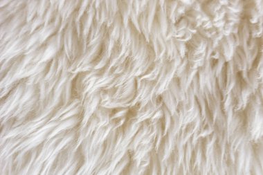Beyaz yumuşak yün dokusu, pamuk, hafif doğal koyun yünü, beyaz kabarık kürk dokusu, bej renkli yün, şeftali renkli kürk