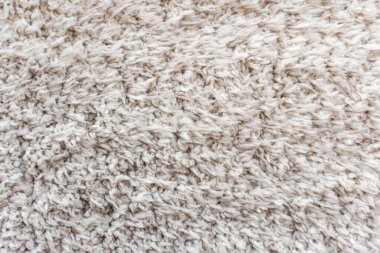 Beyaz yün doku arka plan, açık doğal koyun yünü, beyaz tüylü kürk dokusu, parça parça gri halı, gri halı