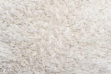 Beyaz yün doku arka plan, hafif doğal koyun yünü, beyaz tüylü kürk dokusu, parça halinde yün halı, gri halı, beyaz halı.