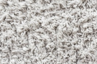Beyaz yün doku arka plan, hafif doğal koyun yünü, beyaz tüylü kürk dokusu, parça halinde yün halı, gri halı, beyaz halı.