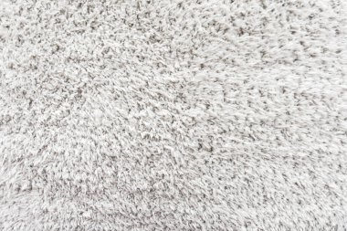 Beyaz yün doku arka plan, hafif doğal koyun yünü, beyaz tüylü kürk dokusu, parça halinde yün halı, gri halı, beyaz halı.