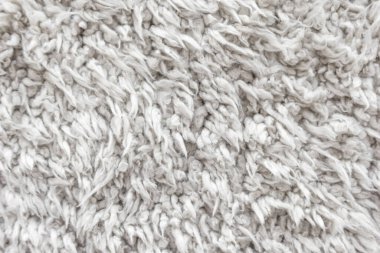 Beyaz yün doku arka plan, hafif doğal koyun yünü, beyaz tüylü kürk dokusu, parça halinde yün halı, gri halı, beyaz halı.