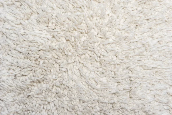 Beyaz yün doku arka plan, hafif doğal koyun yünü, beyaz tüylü kürk dokusu, parça halinde yün halı, gri halı, beyaz halı.