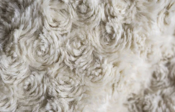 white wool texture background, cotton wool, white fleece, light natural sheep wool, texture of white fluffy fur, white carpet, macro, close up white wool with detail of woven pattern, plush  wool