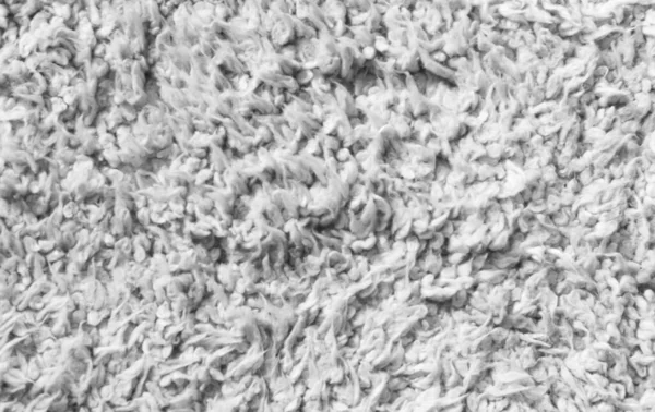 white wool texture background, cotton wool, white fleece, light natural sheep wool, texture of white fluffy fur, white carpet, macro, close up white wool with detail of woven pattern, plush  wool