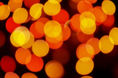 Soyut renkli, odaklanmış dairesel fakül. Bokeh bulanık renk ışığı arka planı kullanabilir. Yeni yıl Bokeh feshi