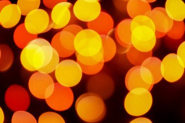 Soyut renkli, odaklanmış dairesel fakül. Bokeh bulanık renk ışığı arka planı kullanabilir. Yeni yıl Bokeh feshi