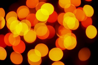 Soyut renkli, odaklanmış dairesel fakül. Bokeh bulanık renk ışığı arka planı kullanabilir. Yeni yıl Bokeh feshi