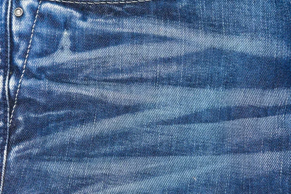 Blå Jeans Med Veck Texturerad Bakgrund — Stockfoto