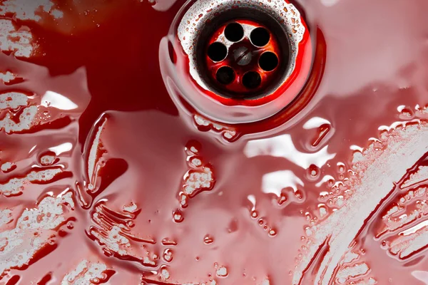 stock image Flowing blood in the sink. Murder concept background