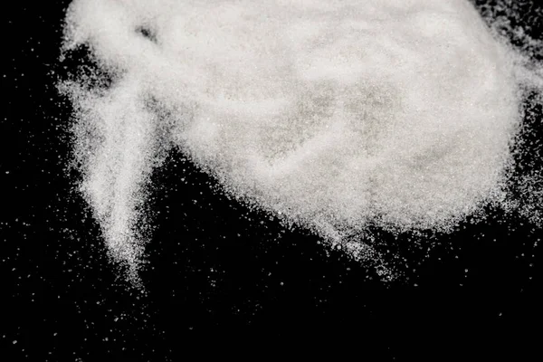 Siyah Arkaplana Yayılmış Şeker — Stok fotoğraf