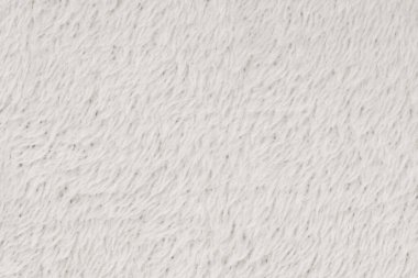 Beyaz desenli beyaz doğal yün. Beyaz, pürüzsüz, yün ekose. Tasarımcılar için tüylü kürk dokusu, yakın plan beyaz yün halı