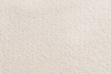 Beyaz desenli beyaz doğal yün. Beyaz, pürüzsüz, yün ekose. Tasarımcılar için tüylü kürk dokusu, yakın plan beyaz yün halı