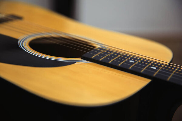 Closeup shot photo of the acoustic guita