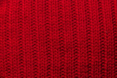 Örme doku kalın iplik, örgü ve düz çizgiler kırmızı arka plan