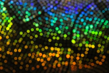 Çok renkli gökkuşağı bokeh koyu arka plan üzerinde bulanık