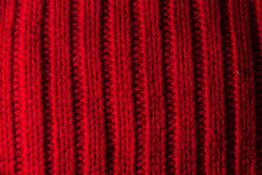 Örme doku kalın iplik, örgü ve düz çizgiler kırmızı arka plan