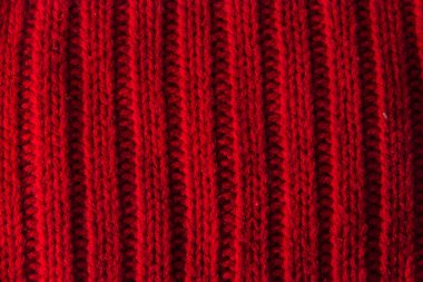 Örme doku kalın iplik, örgü ve düz çizgiler kırmızı arka plan