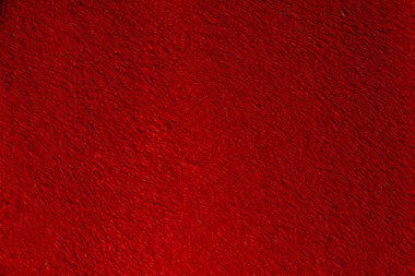 Parlak kırmızı arka plan ile süet doku portre