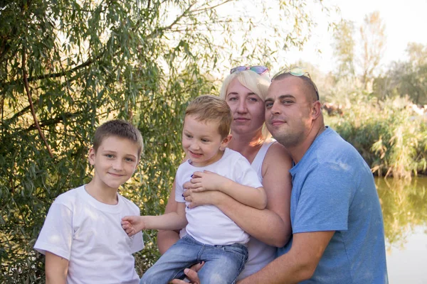 Big Happy Family Four Resting Playing Nature White Shirts Blue — Stock Photo, Image