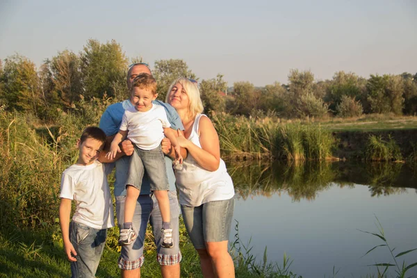 Big Happy Family Four Resting Playing Nature White Shirts Blue — Stock Photo, Image