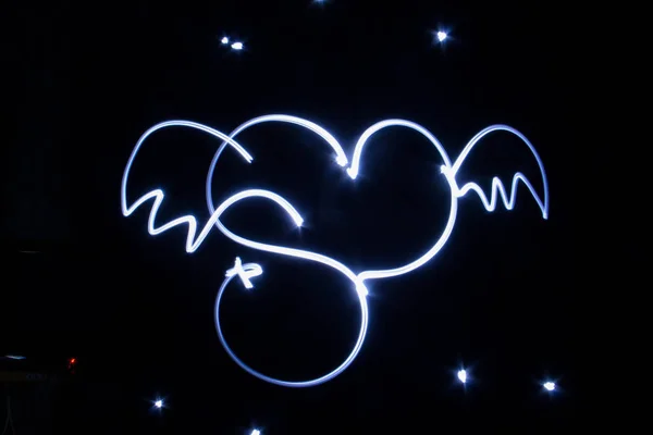 Drawings with light angel or demon wings