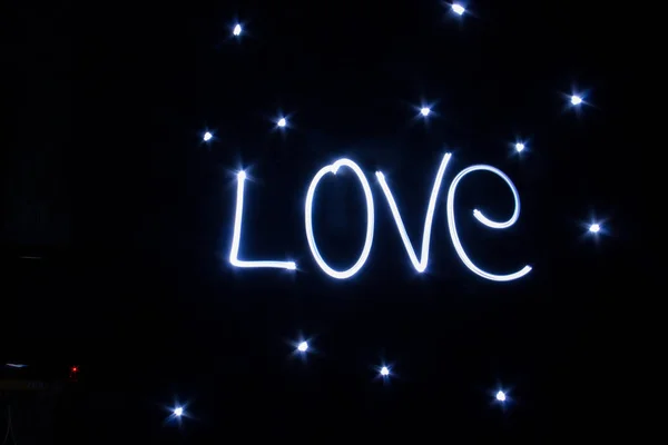 LOVE word written by light — Stock Photo, Image