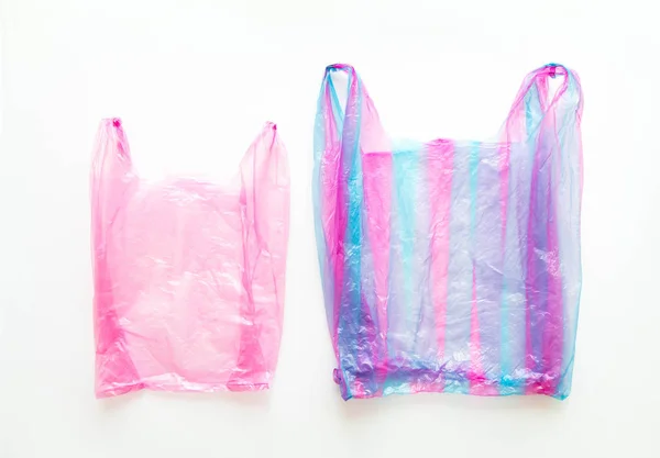 Paar Lelijke Kleurrijke Wegwerp Plastic Zakken Witte Achtergrond Reduce Reuse — Stockfoto